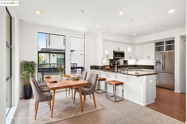 Dining room, Interior, Kitchen, Pendant Lights, Recessed Lighting, Stainless Steel Appliances, Wood Texture Flooring