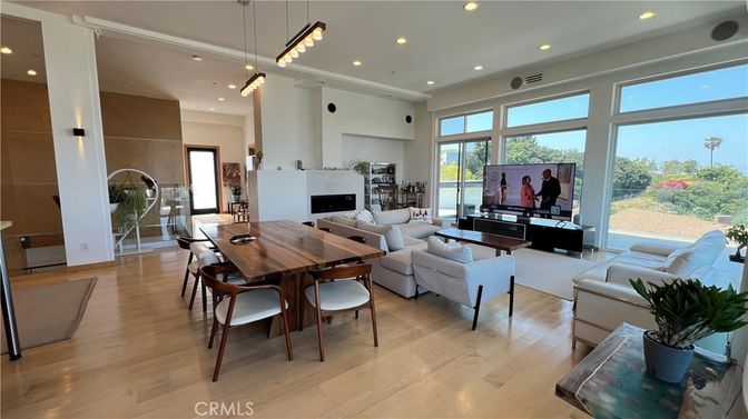 Dining room, Fireplace, Interior, Living room, Pendant Lights, Recessed Lighting, Wood Texture Flooring