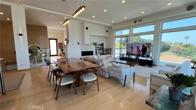 Dining room, Fireplace, Interior, Living room, Pendant Lights, Recessed Lighting, Wood Texture Flooring