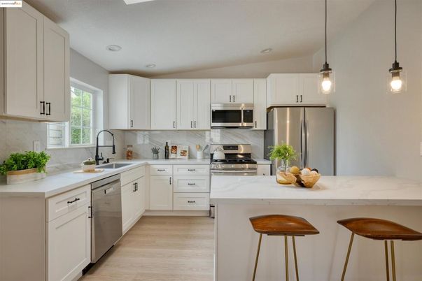 Interior, Kitchen, Pendant Lights, Recessed Lighting, Stainless Steel Appliances, Wood Texture Flooring