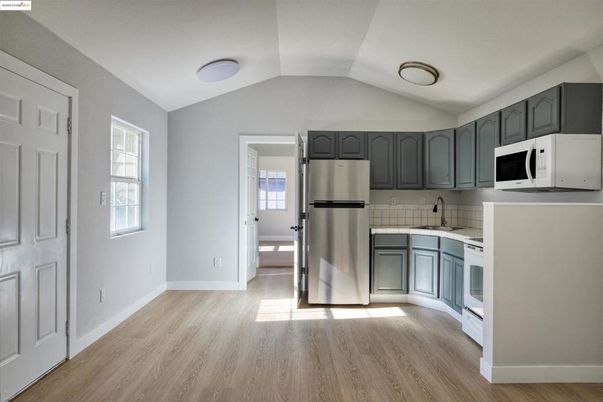 Interior, Kitchen, Tile Countertops, Wood Texture Flooring