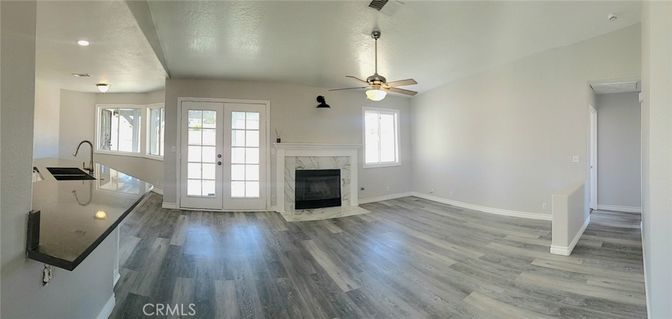 Empty room, Fireplace, Interior, Pendant Lights, Recessed Lighting, Wood Texture Flooring