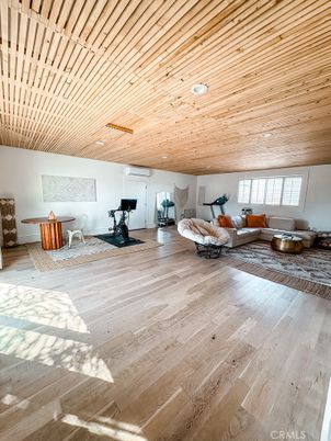 Fitness Equipment, Interior, Living room, Recessed Lighting, Wooden Ceilings, Wood Texture Flooring