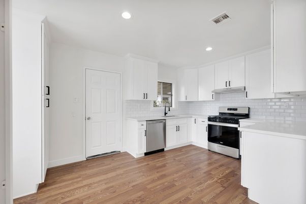 Interior, Kitchen, Recessed Lighting, Stainless Steel Appliances, Wood Texture Flooring