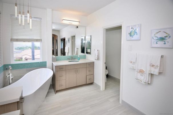 Bathroom, Dual Sink Vanities, Free Standing Baths, Interior, Pendant Lights, Wood Texture Flooring