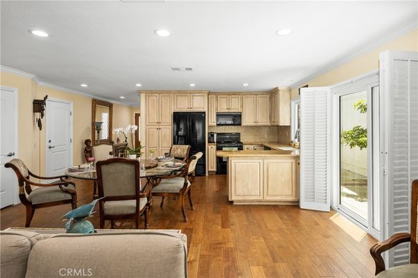 Dining room, Interior, Kitchen, Recessed Lighting, Stainless Steel Appliances, Wood Texture Flooring
