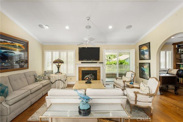 Fireplace, Interior, Living room, Piano, Recessed Lighting, Wood Texture Flooring