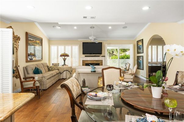 Dining room, Fireplace, Interior, Living room, Recessed Lighting, Wood Texture Flooring