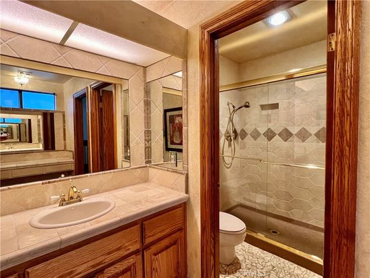 Bathroom, Glass Shower, Interior, Recessed Lighting, Tile Countertops