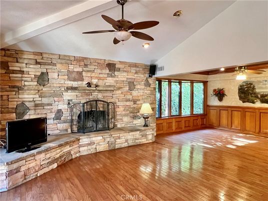 Empty room, Fireplace, Interior, Recessed Lighting, Stone Walls, Wood Texture Flooring