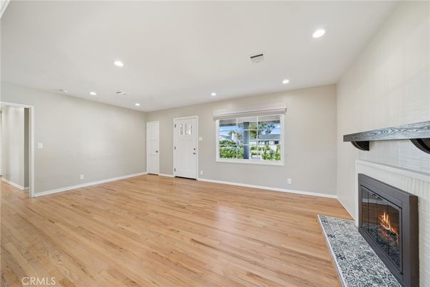 Empty room, Fireplace, Interior, Recessed Lighting, Wood Texture Flooring