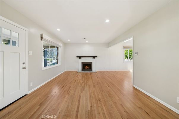 Empty room, Fireplace, Interior, Recessed Lighting, Wood Texture Flooring
