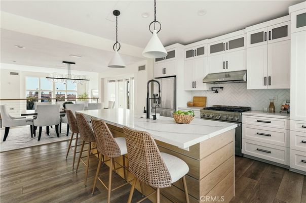 Dining room, Interior, Kitchen, Pendant Lights, Recessed Lighting, Stainless Steel Appliances, Wood Texture Flooring