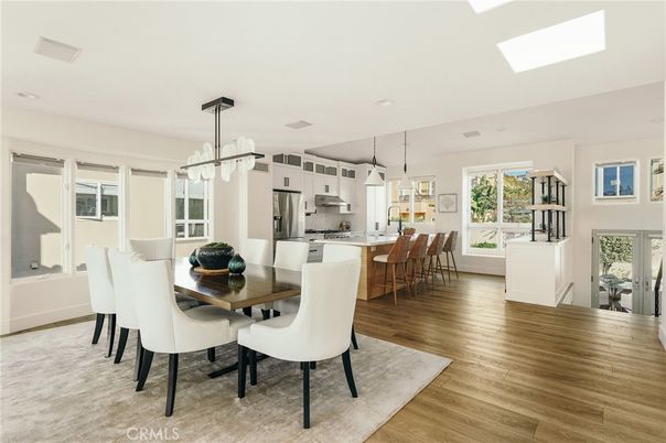 Dining room, Interior, Kitchen, Pendant Lights, Recessed Lighting, Stainless Steel Appliances, Wood Texture Flooring