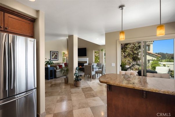 Dining room, Fireplace, Interior, Kitchen, Living room, Pendant Lights, Recessed Lighting, Stainless Steel Appliances