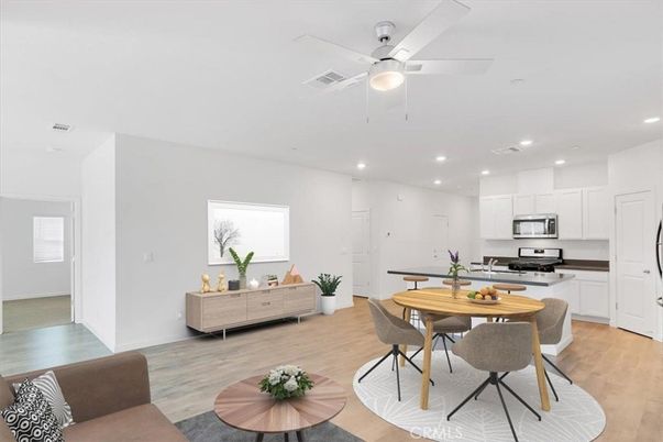 Dining room, Interior, Kitchen, Recessed Lighting, Stainless Steel Appliances, Wood Texture Flooring