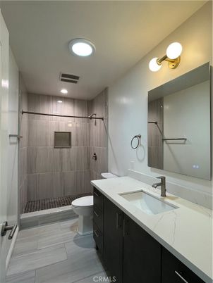 Bathroom, Dual Sink Vanities, Interior, Recessed Lighting, Wood Texture Flooring