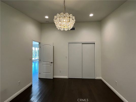 Chandelier, Empty room, Interior, Recessed Lighting, Wood Texture Flooring