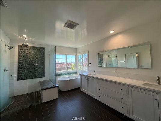 Bathroom, Dual Sink Vanities, Free Standing Baths, Glass Shower, Interior, Recessed Lighting, Wood Texture Flooring