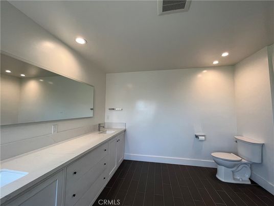 Bathroom, Dual Sink Vanities, Interior, Recessed Lighting, Wood Texture Flooring