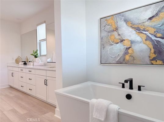 Bathroom, Dual Sink Vanities, Free Standing Baths, Interior, Wood Texture Flooring
