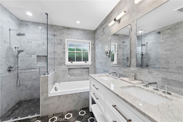 Bathroom, Dual Sink Vanities, Glass Shower, Interior, Marble Walls, Recessed Lighting