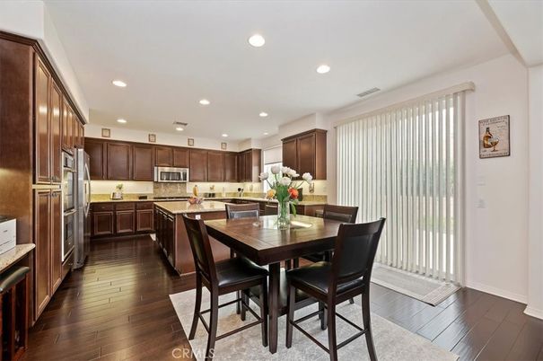 Dining room, Interior, Kitchen, Recessed Lighting, Stainless Steel Appliances, Wood Texture Flooring