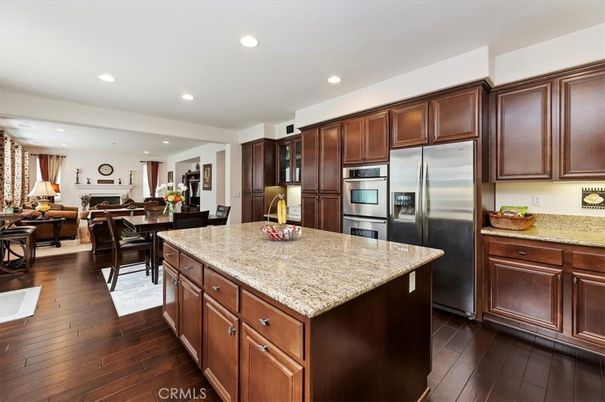 Dining room, Interior, Kitchen, Living room, Recessed Lighting, Stainless Steel Appliances, Wood Texture Flooring