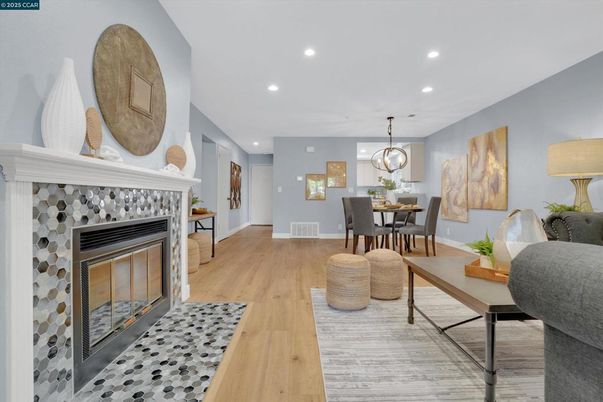 Dining room, Fireplace, Interior, Pendant Lights, Recessed Lighting, Wood Texture Flooring