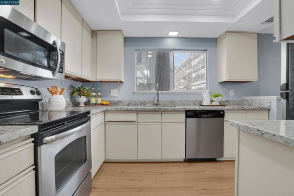 Interior, Kitchen, Recessed Lighting, Stainless Steel Appliances, Wood Texture Flooring