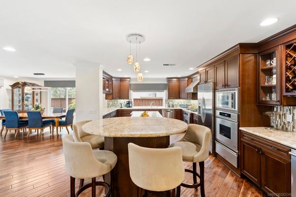 Dining room, Interior, Kitchen, Pendant Lights, Recessed Lighting, Stainless Steel Appliances, Wood Texture Flooring