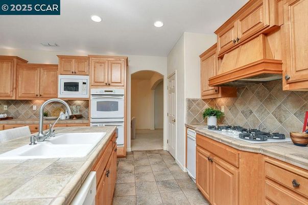 Interior, Kitchen, Recessed Lighting, Tile Countertops