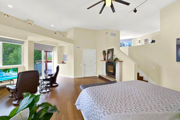 Bedroom, Fireplace, Interior, Recessed Lighting, Wood Texture Flooring