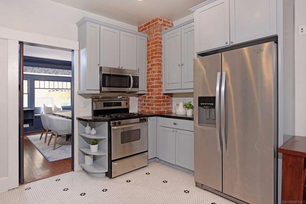 Dining room, Interior, Kitchen, Recessed Lighting, Stainless Steel Appliances, Stone Walls, Wood Texture Flooring