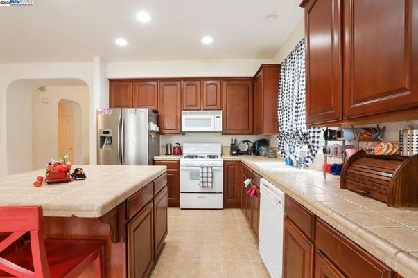 Interior, Kitchen, Recessed Lighting, Stainless Steel Appliances, Tile Countertops