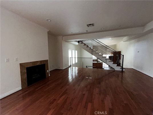 Empty room, Fireplace, Interior, Recessed Lighting, Wood Texture Flooring