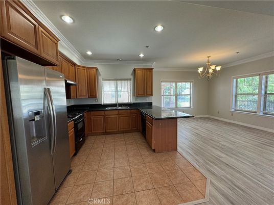 Chandelier, Interior, Kitchen, Recessed Lighting, Stainless Steel Appliances, Wood Texture Flooring