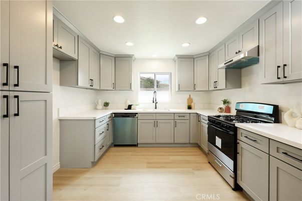 Interior, Kitchen, Recessed Lighting, Stainless Steel Appliances, Wood Texture Flooring