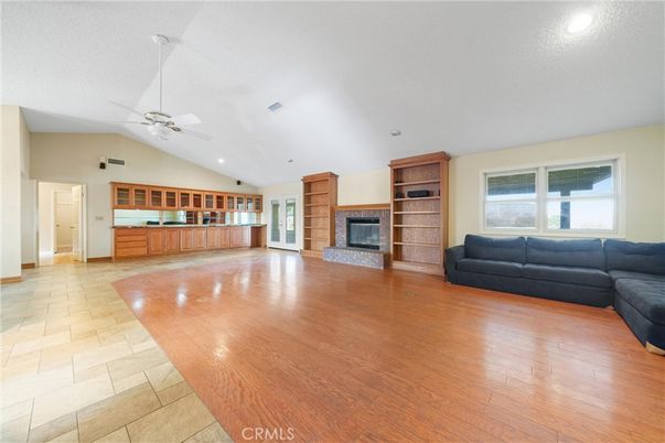 Empty room, Fireplace, Interior, Living room, Recessed Lighting, Wood Texture Flooring
