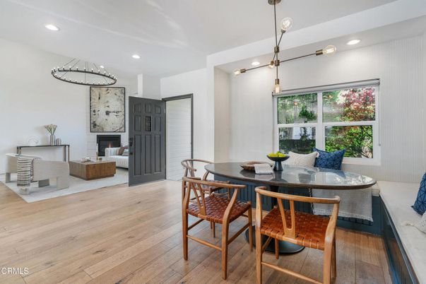 Dining room, Fireplace, Interior, Living room, Pendant Lights, Recessed Lighting, Wood Texture Flooring