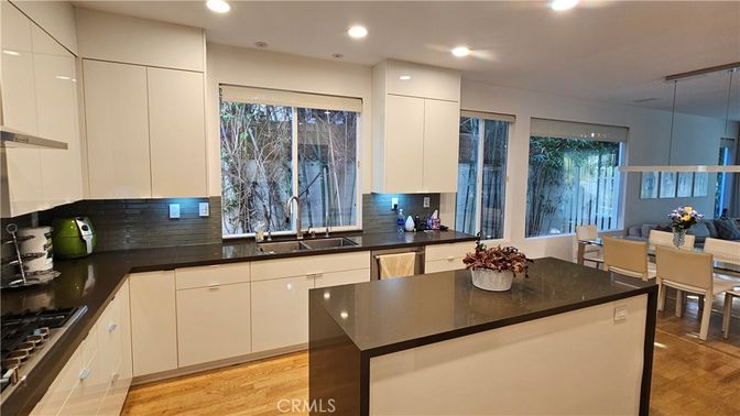 Dining room, Interior, Kitchen, Recessed Lighting, Stainless Steel Appliances, Wood Texture Flooring