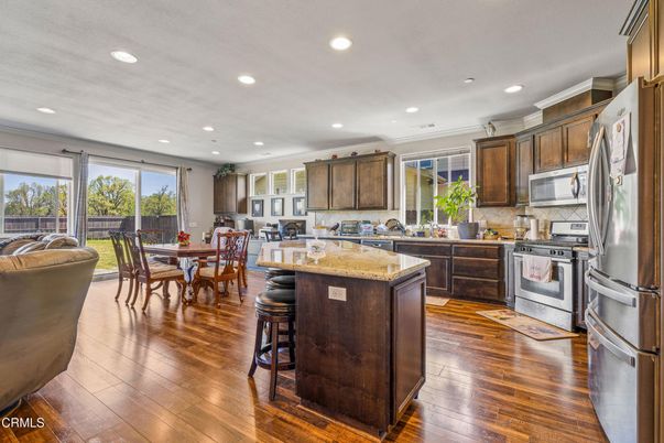 Dining room, Interior, Kitchen, Recessed Lighting, Stainless Steel Appliances, Wood Texture Flooring