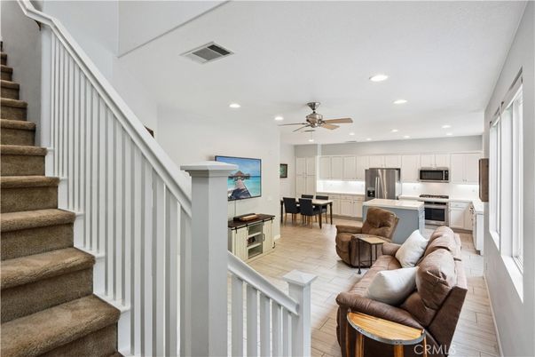 Dining room, Interior, Kitchen, Living room, Recessed Lighting, Stainless Steel Appliances, Wood Texture Flooring
