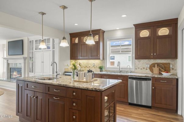 Fireplace, Interior, Kitchen, Pendant Lights, Recessed Lighting, Stainless Steel Appliances, Wood Texture Flooring