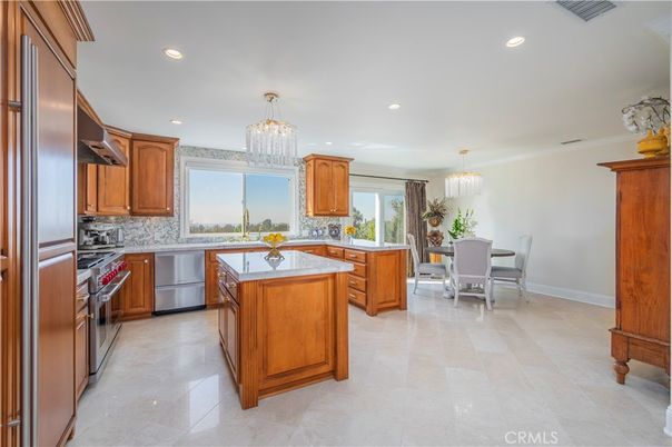 Chandelier, Dining room, Interior, Kitchen, Pendant Lights, Recessed Lighting, Stainless Steel Appliances
