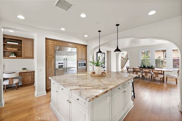 Dining room, Interior, Kitchen, Pendant Lights, Recessed Lighting, Stainless Steel Appliances, Wood Texture Flooring