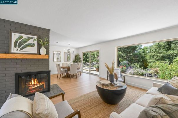 Chandelier, Dining room, Fireplace, Interior, Living room, Stone Walls, Wood Texture Flooring