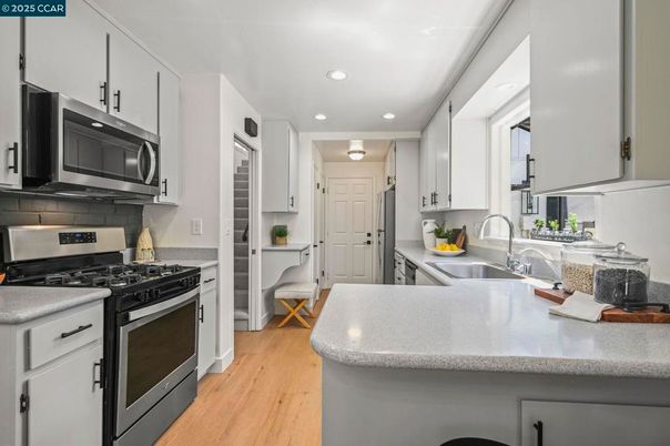 Interior, Kitchen, Recessed Lighting, Stainless Steel Appliances, Wood Texture Flooring