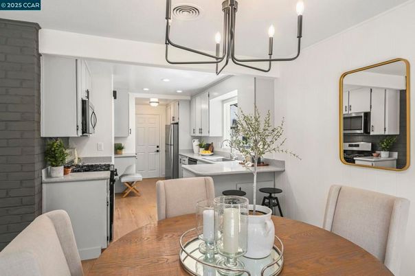 Dining room, Interior, Kitchen, Pendant Lights, Recessed Lighting, Stainless Steel Appliances, Wood Texture Flooring