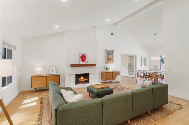 Dining room, Fireplace, Interior, Living room, Pendant Lights, Recessed Lighting, Wood Texture Flooring